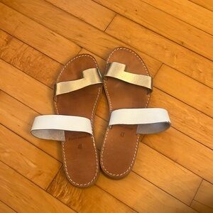 Like new, gold and white Grecian style sandals, purchased in Greece, size 41/9